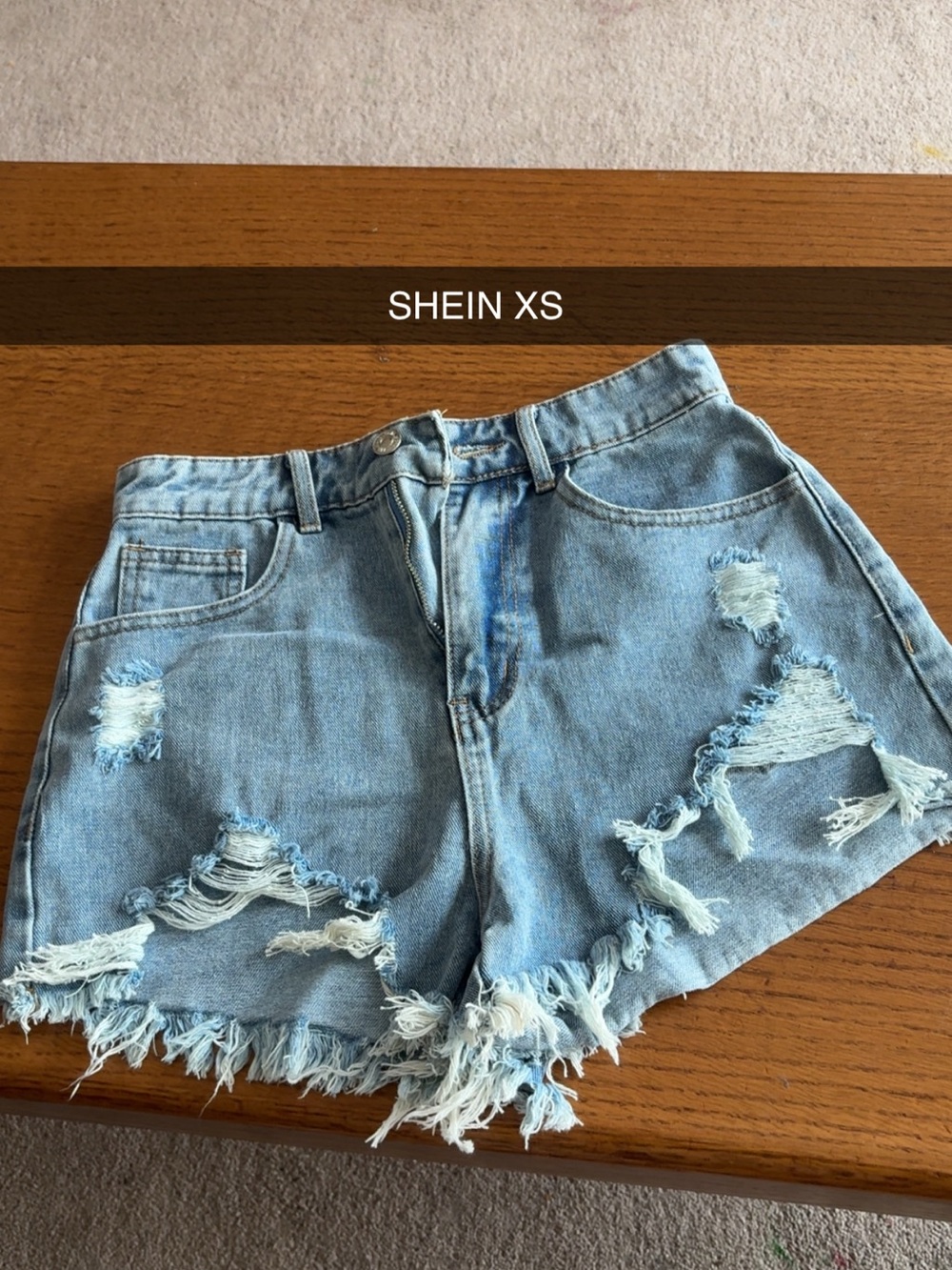 SHEIN Light Blue Ripped High-Rise Denim Shorts